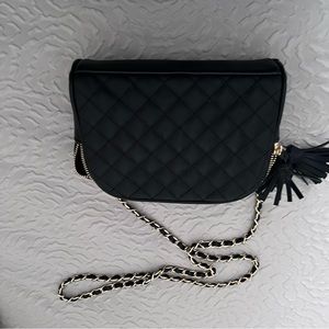 Sleek black with gold chain